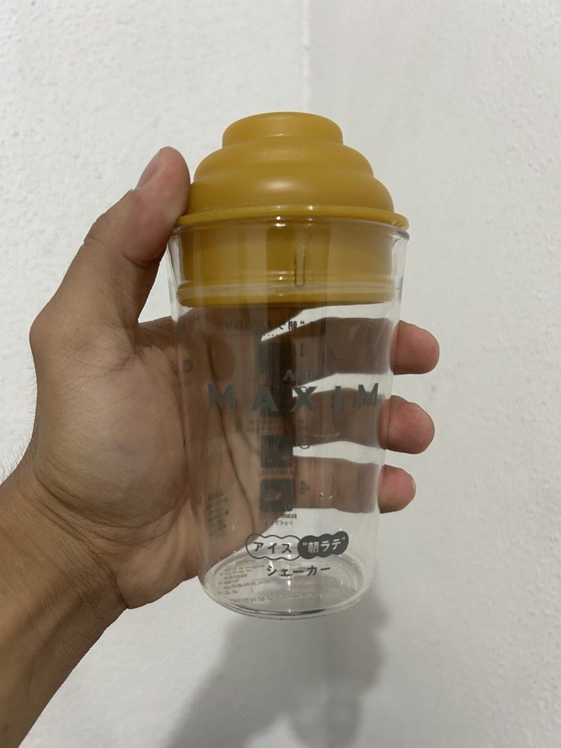 Maxim Ice "Morning Latte" Shaker Bottle (Category: Water Bottles & Tumblers) located in Manila. Submitted by potchi.thrifts (Listing ID 1441595646, Image 1). Description: - Maxim Shaker Bottle - Clear glass with yellow lid - Ideal for making homemade lattes and favorite drinks - Features convenient measurement markings - Easy to use and clean - Perfect for coffee lovers.