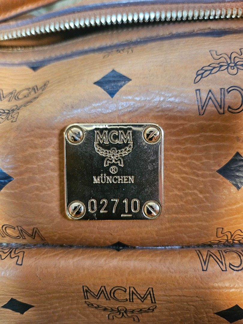 MCM Cognac Boston Bag (Category: Luxury Bags & Wallets) located in Marikina City. Submitted by diva_exclusives (Listing ID 1441633300, Image 2). Description: MCM Cognac Doctors Boston Bag Keychains come with the bag Japan Sourced Condition: Normal signs of use like rubs on the sides.. Issue: stitching inside Negotiable For more inquires feel free to PM.. thanks!.