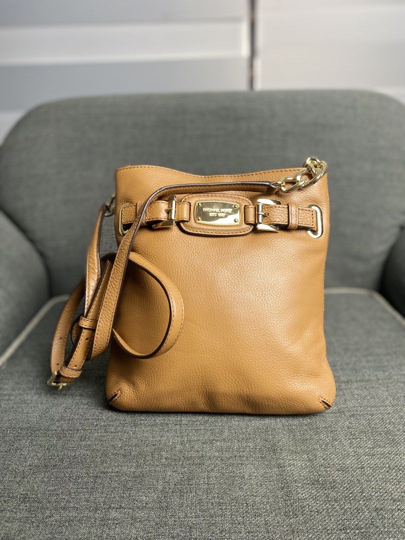 Michael Kors Leather Crossbody Bag - Camel (Category: Cross-body Bags) located in Iloilo. Submitted by lux_d2 (Listing ID 1441626883, Image 1). Description: - Authentic Michael Kors camel leather crossbody bag - Elegant gold hardware details - Adjustable strap for comfortable wear - Ample interior space for your essentials - Clean and well-maintained interior - Bag is in good, pre-loved condition - Ideal for everyday use.