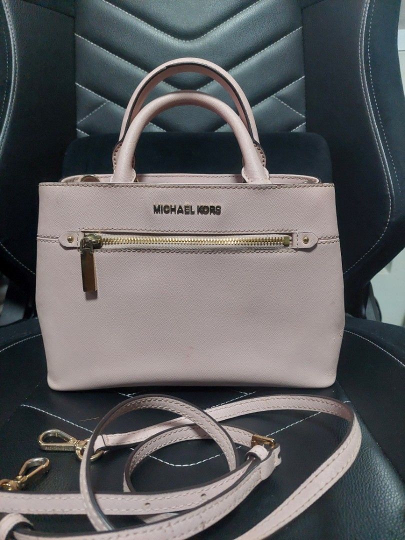 Michael Kors Sling Bag (Category: Luxury Bags & Wallets) located in Rizal. Submitted by stobelly (Listing ID 1441715996, Image 1). Description: Preloved, original MK bag Still in good condition with signs of usage Selling low.
