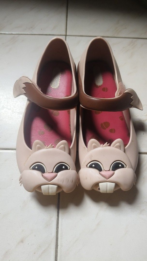 Mini Melissa Pink Bunny Jelly Flats (Category: Babies & Kids Fashion) located in Tarlac. Submitted by its_jess (Listing ID 1441607424, Image 1). Description: - Cute pink jelly flats for kids - Adorable bunny face design with little ears on the front - Strap features a brown detail - Inner lining has a cute pink pattern - Made in Brazil - Ideal for everyday wear.