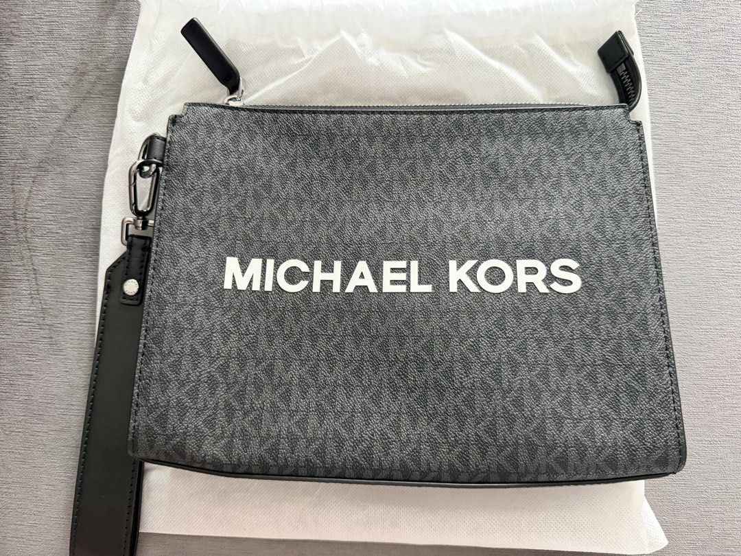 MK clutch bag (Category: Luxury Bags & Wallets) located in Manila. Submitted by angela.star (Listing ID 1441641754, Image 1). Description: Brand new condition 100% original Bought in Japan With dustbag .