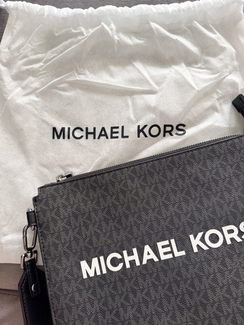 MK clutch bag (Category: Luxury Bags & Wallets) located in Manila. Submitted by angela.star (Listing ID 1441641754, Image 2). Description: Brand new condition 100% original Bought in Japan With dustbag .