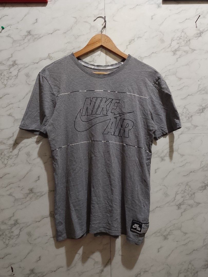 Nike Air T-Shirt (Category: Tshirts & Polo Shirts ) located in Paranaque City. Submitted by lanceee.999 (Listing ID 1441769218, Image 1). Description: Size: M Dimes: W20.5 L28 Legit/Authentic No Issue Good Condition.