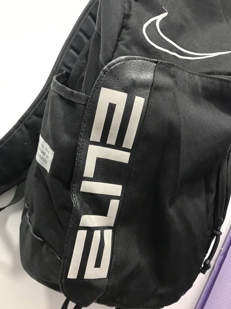 Nike Elite Black Backpack (Category: Backpacks) located in Bamban. Submitted by ukaythriftedkoto (Listing ID 1441731101, Image 3). Description: - Black Nike Elite backpack - Prominent Nike swoosh logo on the front - 'Elite' text visible on front and back - Padded straps for maximum comfort - Multiple pockets and zippers for organized storage - Ideal for sports, school, or everyday carry.