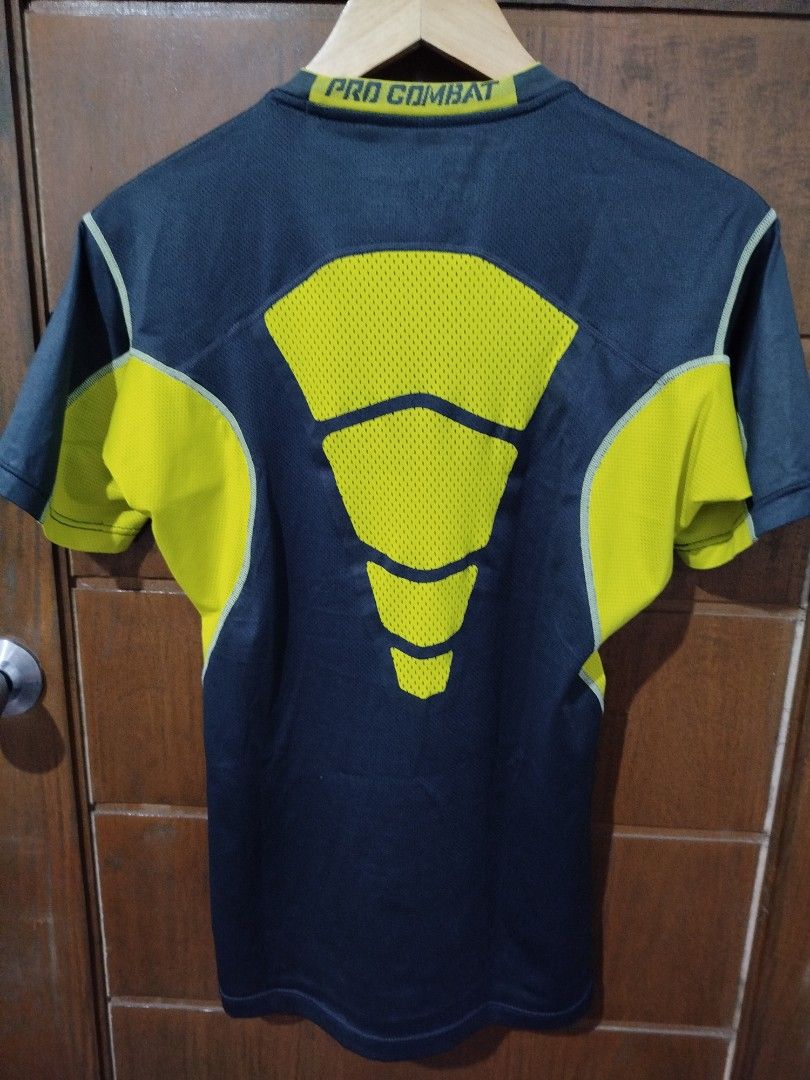 Nike Pro Combat Dri-Fit Compression T-shirt (Category: Activewear) located in Dipolog. Submitted by x1987 (Listing ID 1441691310, Image 2). Description: - Grey and yellow Nike Pro Combat Dri-Fit compression t-shirt - Short sleeves - Ideal for workouts and sports - Breathable mesh panels on the back - Comfortable and secure fit.