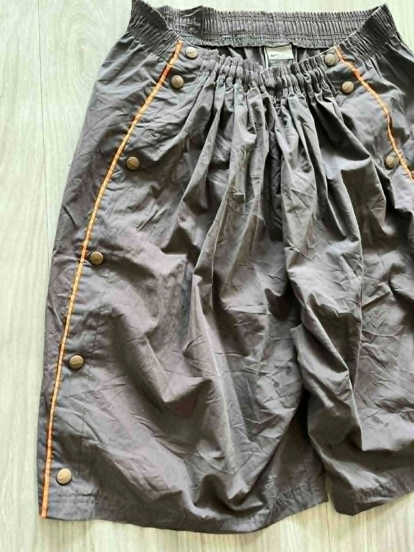 Nike Tearaway Snap Button Shorts (Category: Shorts) located in Caloocan City. Submitted by archive404 (Listing ID 1441593102, Image 2). Description: Nike Tearaway Snap Button Shorts 🔥 • Width: 29 stretchable up to 34 • Thigh: 14.5 • Length: 23 • Hem/Leg Opening: 13 • Issue: sign of usage • Item are Off/Legit 🏷️ 199 + SF 📸 Photos may vary due to lighting ♻️ Please manage expectations — all items are thrifted/preloved 📍 Camarin, Caloocan City �