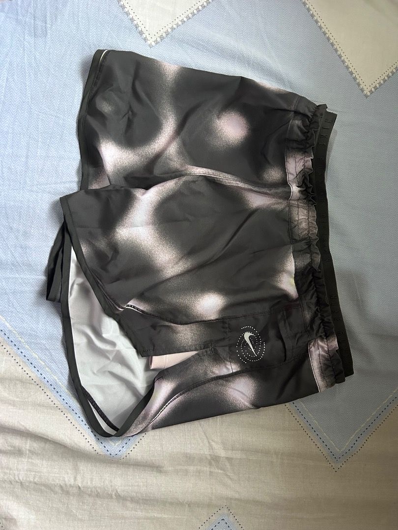 Nike Tempo Luxe Running Shorts (Category: Activewear) located in Quezon City. Submitted by carlaxmarie (Listing ID 1441730273, Image 3). Description: - Lightweight and quick-drying printed shorts - Built-in shorts for stretchy coverage - Convenient pockets for storage - Nike Dri-FIT technology for dryness and comfort - Elastic waistband with drawstring for a secure fit - Smooth outer woven fabric.