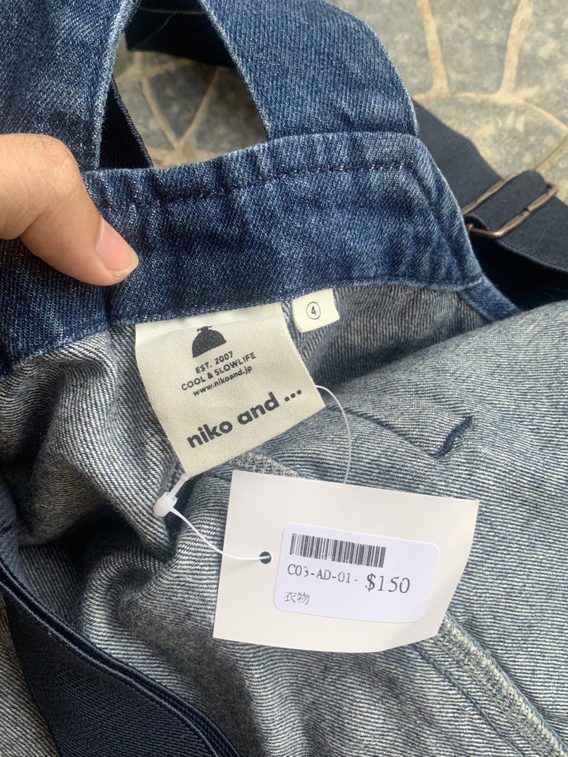 Niko and... Denim Overalls (Category: Sets & Coordinates) located in Daraga. Submitted by palm.garments (Listing ID 1441685746, Image 3). Description: - Authentic - Tagged Size: L - Condition: 9/10 - No issue - Fabric: 100% Cotton - Made in: China - Style Code: S205DL06SW Dimensions: - Width: ~24” (Bib width) - Length: ~30” (Body length) Dm! Note: This is a full denim jumpsuit/overalls from niko and... JEANS line, featuring adjustable cross-back 