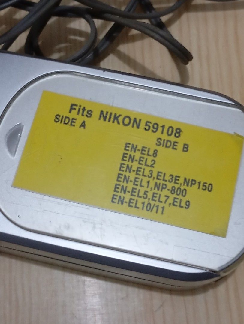 Nikon battery charger (Category: Batteries & Chargers) located in Las Pinas. Submitted by quick_deals_great_finds2 (Listing ID 1441769754, Image 3). Description: Good working condition.