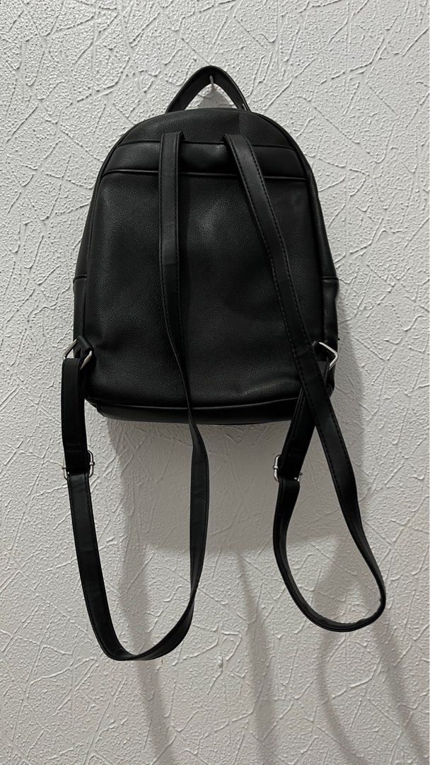 Nine West Black Faux Leather Mini Backpack (Category: Backpacks) located in Naga. Submitted by lilycheedeclutter (Listing ID 1441741744, Image 2). Description: ‼️ HAS FLAW: Front pocket zipper (check last pic for reference) ‼️ L: 9” W: 3.3” H: 11” CAN FIT IPAD 11TH GEN .