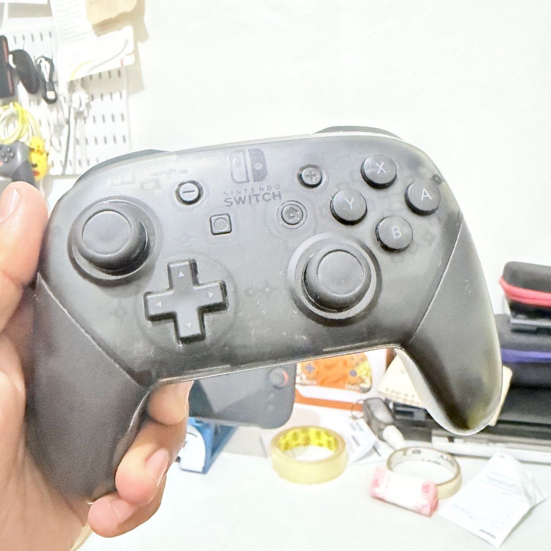Nintendo switch procon pro controller compatible with v1 v2 oled switch 2 (Category: Controllers) located in Valenzuela. Submitted by gearpandaph (Listing ID 1441773892, Image 3). Description: Nintendo switch procon pro controller compatible with v1 v2 oled switch 2 No functionality issue Some sign of usage Valenzuela area po me.