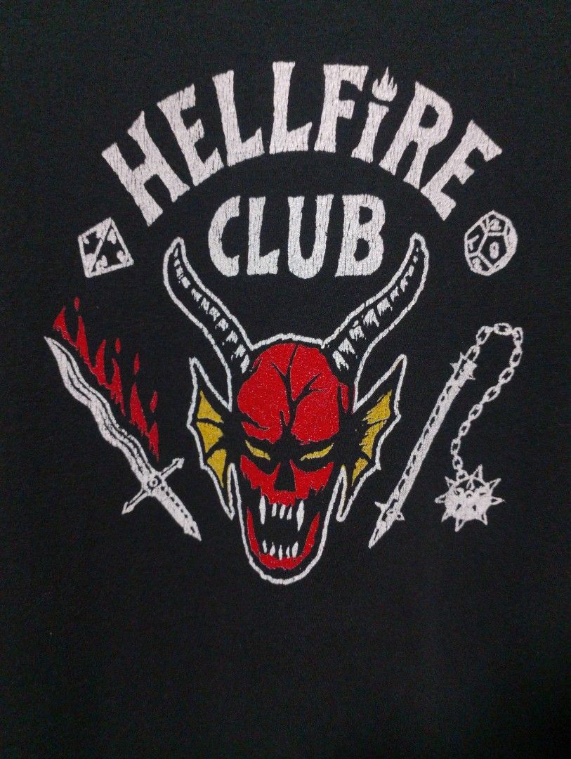 Official Netflix Merch Stranger things "Hellfire club" Size Medium (Category: Shirts) located in Maasin. Submitted by throwingreverse (Listing ID 1441735504, Image 2). Description: official Netflix merchandise featuring the iconic Hellfire Club design from Stranger Things. Size: Medium Dimes: L 25 W 18 Issue: None Color rate: 9.8/10 MOP: Gcash Location: SOUTHERN LEYTE.
