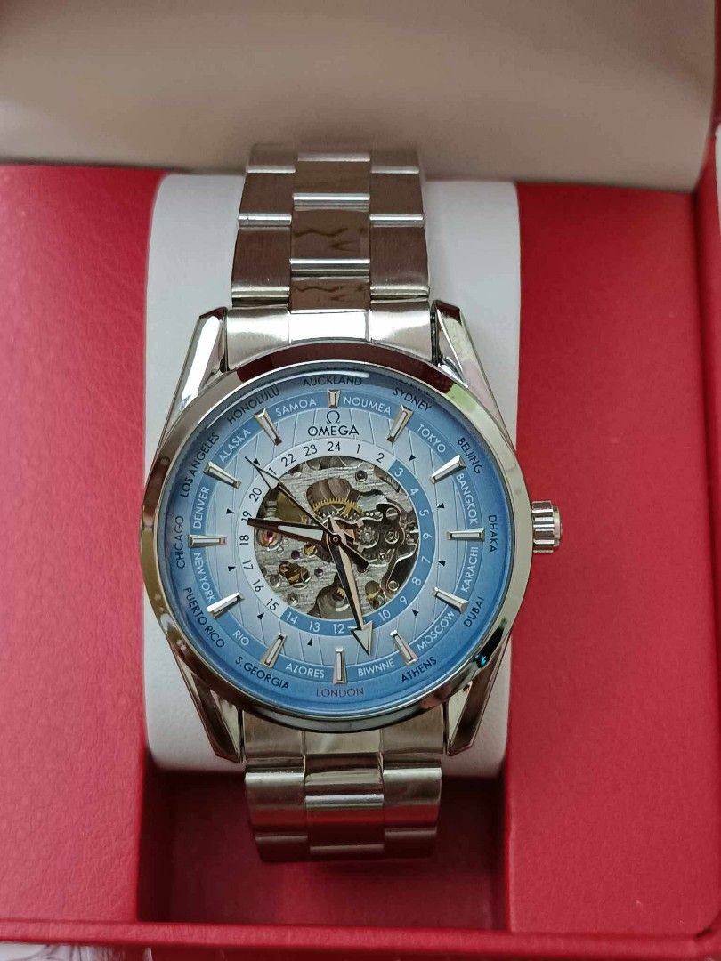 Omega Constellation Co-Axial World Timer Automatic Men's Watch (Category: Men's Watches) located in Manila. Submitted by crustynico23 (Listing ID 1441603831, Image 1). Description: - Omega Constellation Co-Axial World Timer - Automatic movement with exhibition case back - Stainless steel bracelet with deployant clasp - Blue dial featuring city markers for world time - Includes original box.