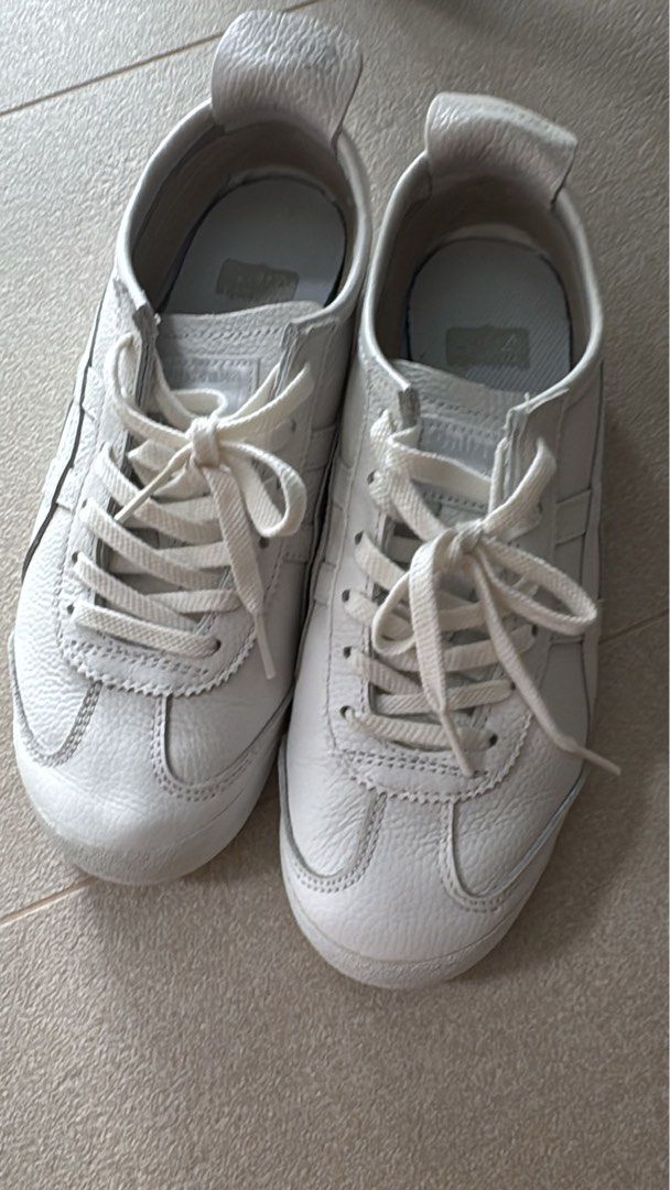 Onitsuka Tiger Mexico 66 White Leather Sneakers - Authentic (Category: Sneakers) located in Singapore. Submitted by blessingbabe (Listing ID 1441680971, Image 1). Description: - Classic Onitsuka Tiger Mexico 66 - Colour: White - Size: 23.5cm / EU 37.5 / UK 4 - Perfect for daily wear - wore 2-3times only Retail over $200plus.
