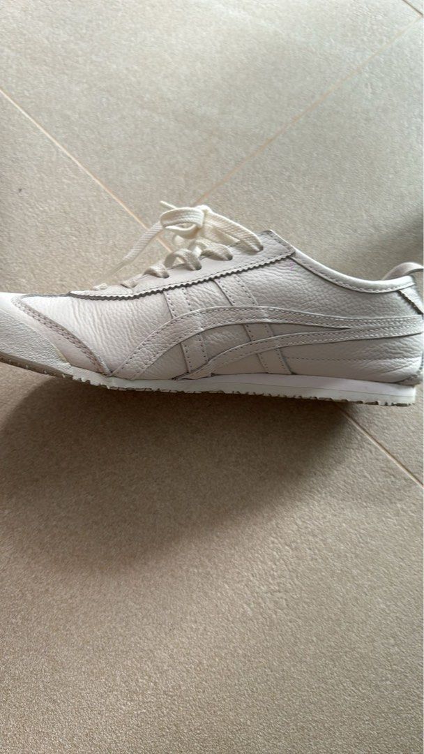 Onitsuka Tiger Mexico 66 White Leather Sneakers - Authentic (Category: Sneakers) located in Singapore. Submitted by blessingbabe (Listing ID 1441680971, Image 2). Description: - Classic Onitsuka Tiger Mexico 66 - Colour: White - Size: 23.5cm / EU 37.5 / UK 4 - Perfect for daily wear - wore 2-3times only Retail over $200plus.