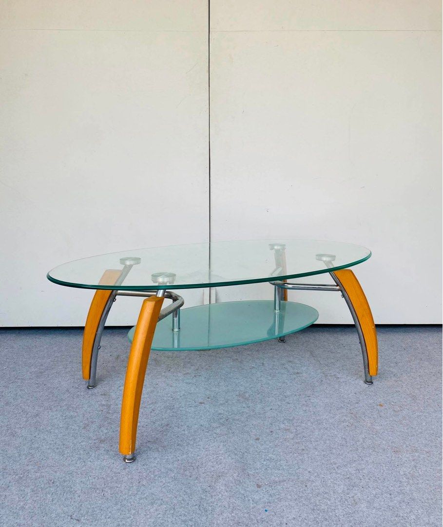 OVAL GLASS CENTER TABLE (Category: Tables & Sets) located in Manila. Submitted by jerichocal17856 (Listing ID 1441704573, Image 1). Description: “JAPAN SURPLUS” OVAL GLASS CENTER TABLE STAINLESS WOOD AND FROSTED GLASS ACCENT SIZE: 42.5L” x 23W” x 17H” inches ( AS-IS ITEM ) IN GOOD CONDITION.