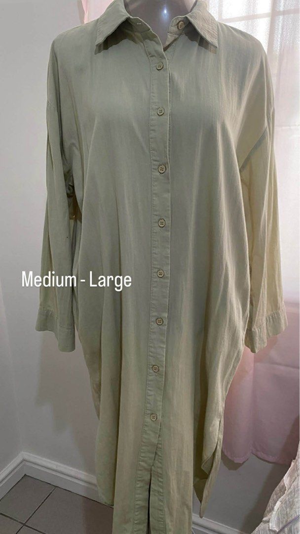 Oversized Button-Up Shirt Dress - Light Green (Category: Dresses) located in Subic. Submitted by raeux (Listing ID 1441740981, Image 1). Description: - Oversized shirt dress - Light green color - Long sleeves with button cuffs - Full button-down front - Collared neckline - Side slits for easy movement - Versatile: wear as a dress or open as a layering piece - Fits like a Medium to Large.