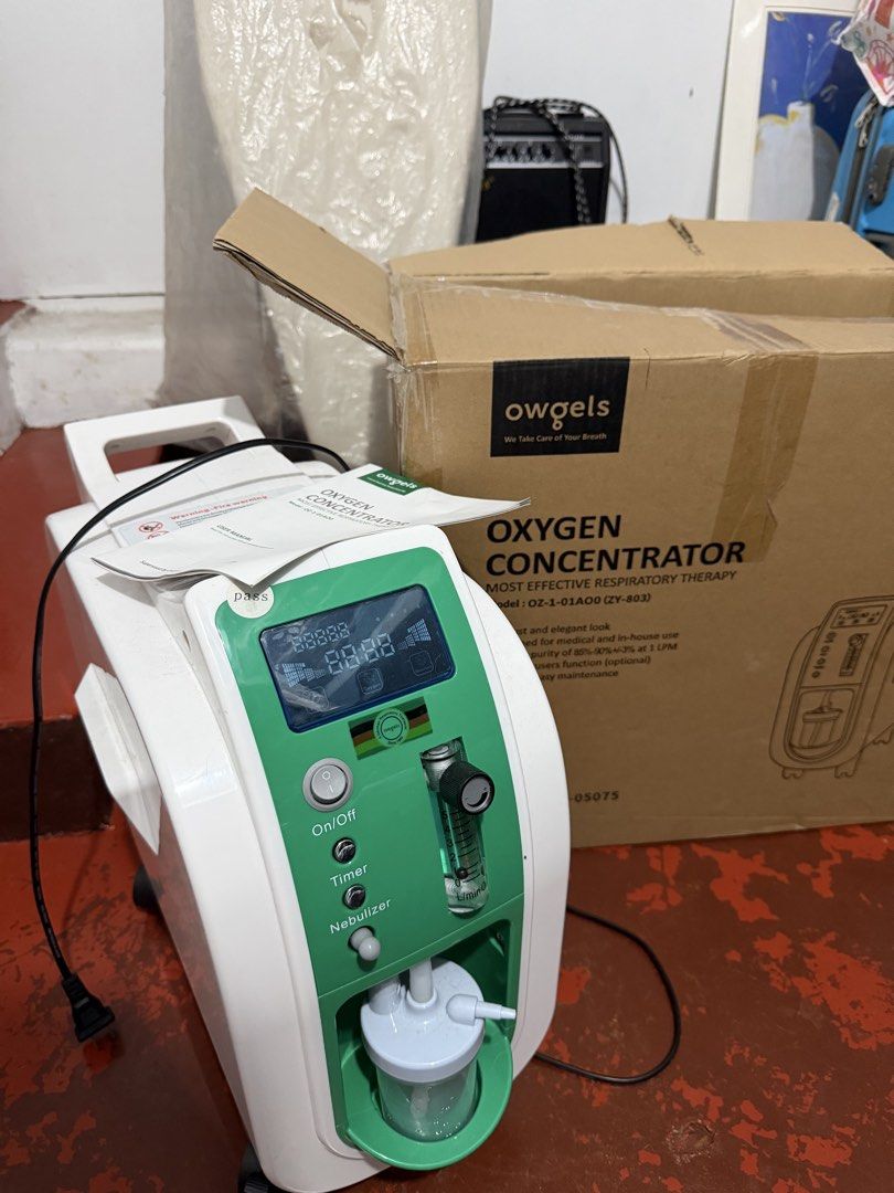 Owgel Oxygen Concentrator OZ-1-01A with Nebulizer Kit (Category: Medical Supplies & Tools) located in Quezon City. Submitted by chizvee (Listing ID 1441634647, Image 3). Description: - Owgel Oxygen Concentrator, Model OZ-1-01A - Includes Nebulizer Kit and Tubing - Timer and On/Off Functions - Digital Display for Settings - Ideal for Respiratory Support - Easy to Operate and Maintain - All Accessories Included (as pictured) 1month used.