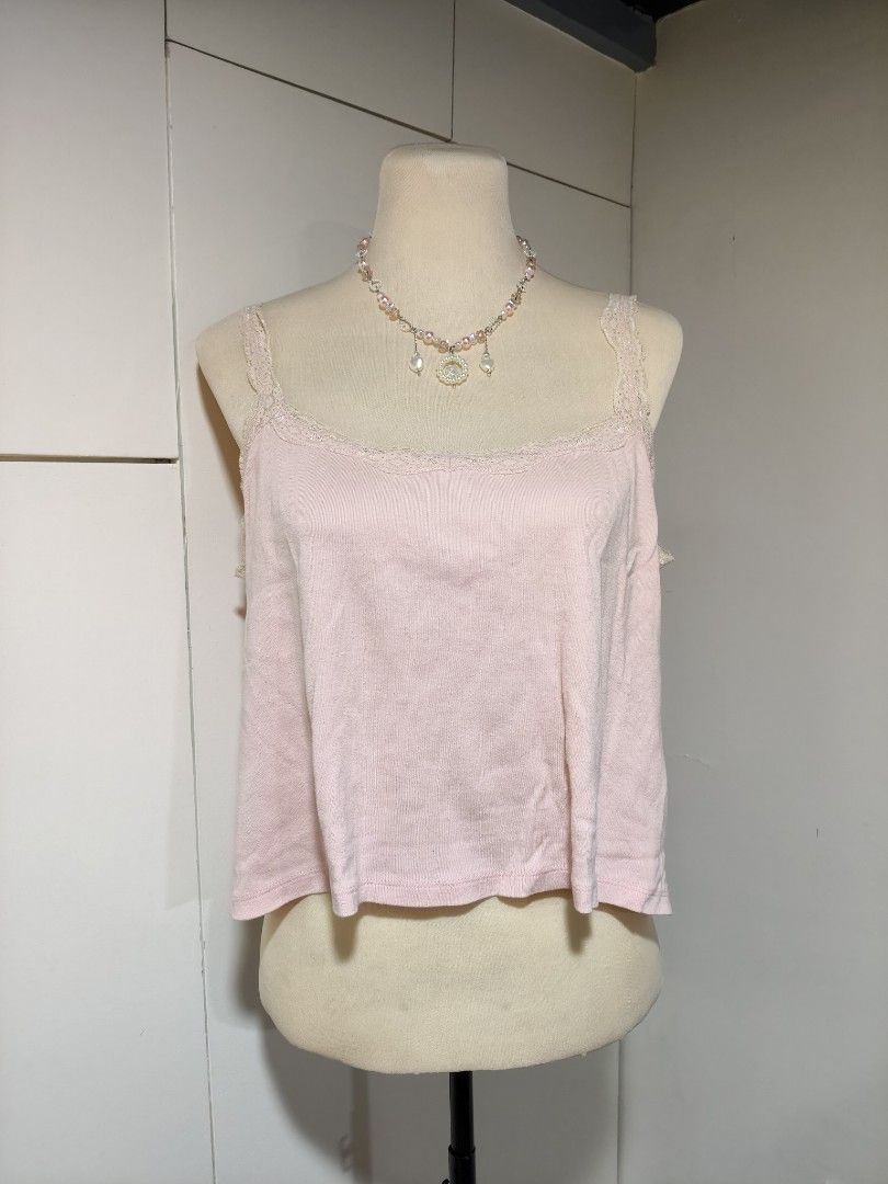 Pink Lace Trim Cami Top (Category: Sleeveless) located in Sison. Submitted by muchiberry (Listing ID 1441640391, Image 1). Description: size: m-l but xl on tag desc: loose fit flaws: faded color on straps overall condition: 9/10 mop: gcash, maribank, maya, bpi. NO COD disclaimer: these are PRELOVED clothes so manage your expectations. all noticeable flaws are listed, but there may be some that are missed. we can discuss more thru chat :>.