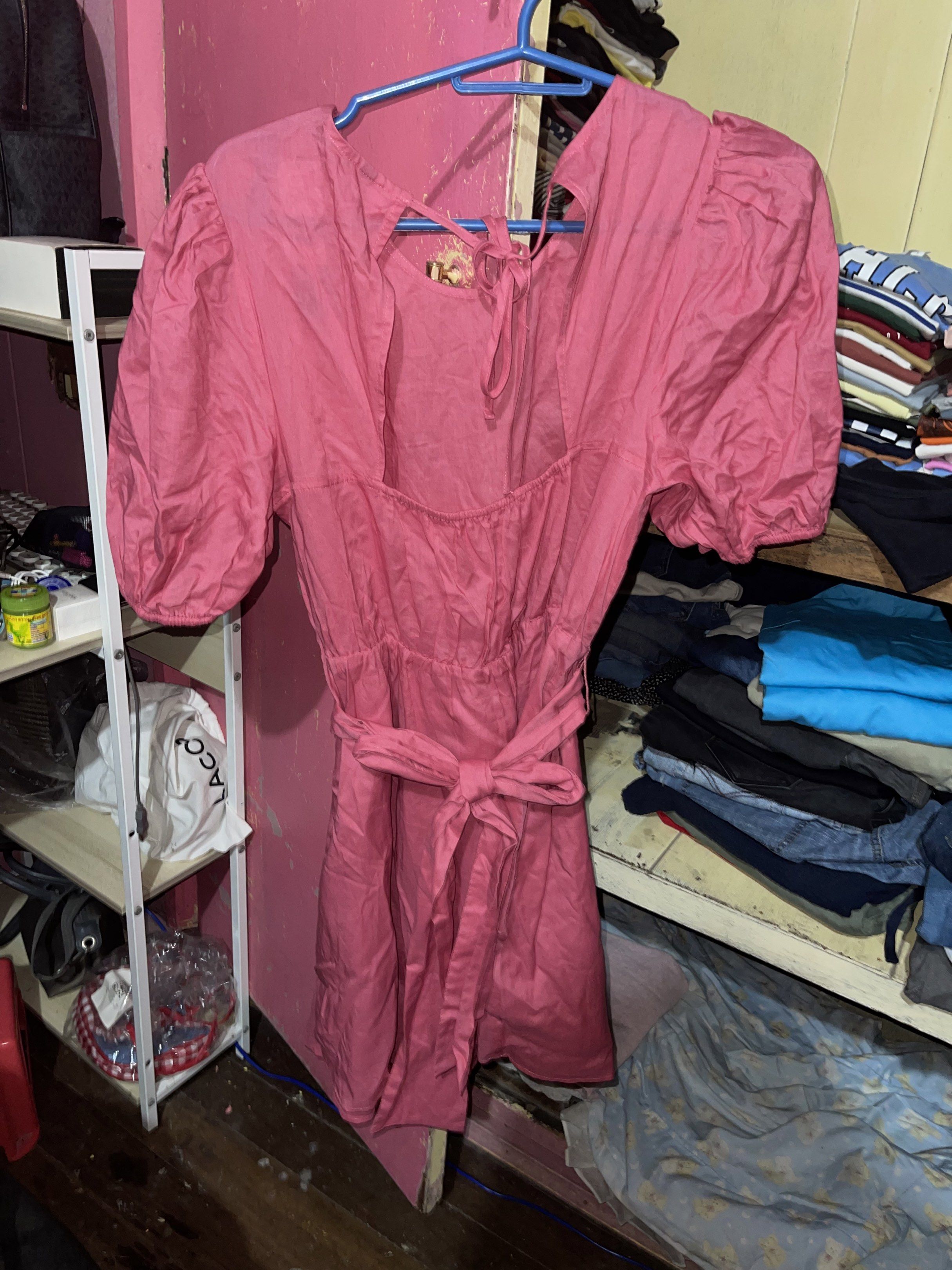 Pink Puff Sleeve Tie Back Mini Dress (Category: Dresses) located in Quezon City. Submitted by rish40 (Listing ID 1441743314, Image 2). Description: - Adorable pink dress with charming puff sleeves. - Features a flattering square neckline and adjustable tie-back. - Comfortable elasticated waist cinched with a matching tie belt. - Flirty, short flared skirt for a playful look. - Versatile for casual days or party events. - Effortless to wear and st