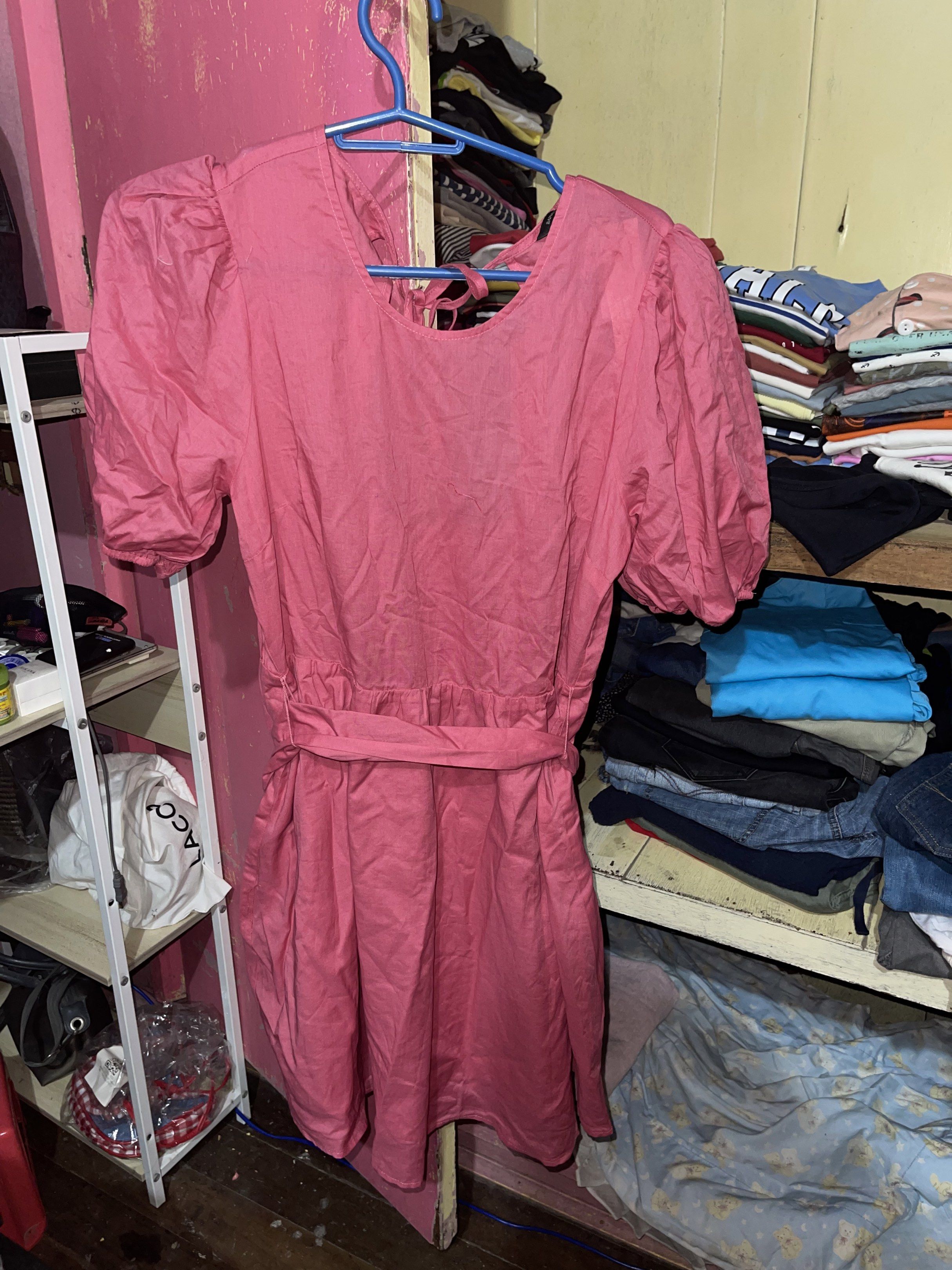 Pink Puff Sleeve Tie Back Mini Dress (Category: Dresses) located in Quezon City. Submitted by rish40 (Listing ID 1441743314, Image 1). Description: - Adorable pink dress with charming puff sleeves. - Features a flattering square neckline and adjustable tie-back. - Comfortable elasticated waist cinched with a matching tie belt. - Flirty, short flared skirt for a playful look. - Versatile for casual days or party events. - Effortless to wear and st