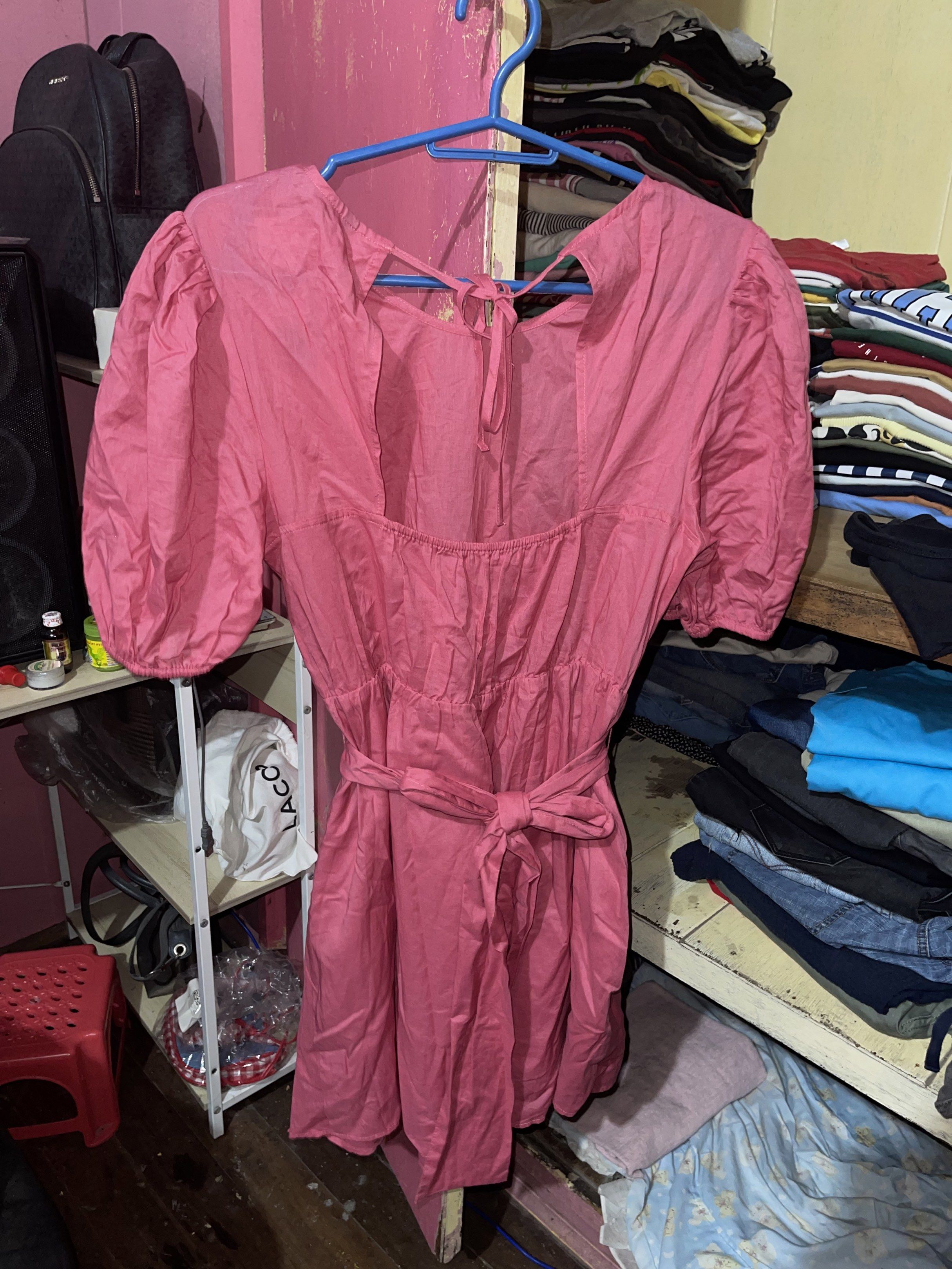 Pink Puff Sleeve Tie Back Mini Dress (Category: Dresses) located in Quezon City. Submitted by rish40 (Listing ID 1441743314, Image 3). Description: - Adorable pink dress with charming puff sleeves. - Features a flattering square neckline and adjustable tie-back. - Comfortable elasticated waist cinched with a matching tie belt. - Flirty, short flared skirt for a playful look. - Versatile for casual days or party events. - Effortless to wear and st