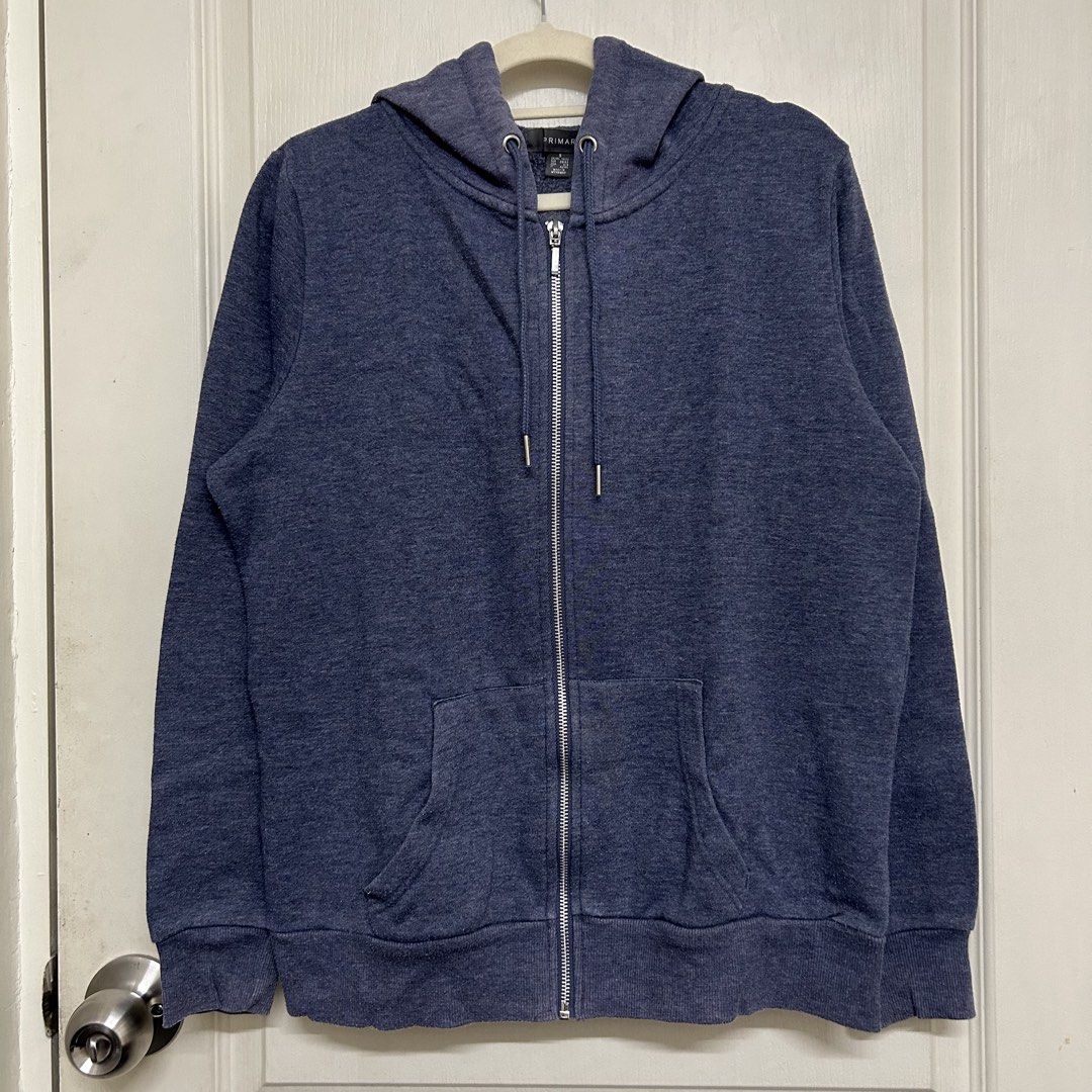 Preloved | Primark Blue Zip-up Hoodie (Category: Coats, Jackets and Outerwear) located in Caloocan City. Submitted by trisdeclutters (Listing ID 1441716110, Image 1). Description: Last price already Women's hoodie (pwede unisex) Width: 21" Length: 24" Sleeve length: 23" With 2 pockets Signs of usage only ‼️no reservations, exchange, cancellation, return, refund‼️.