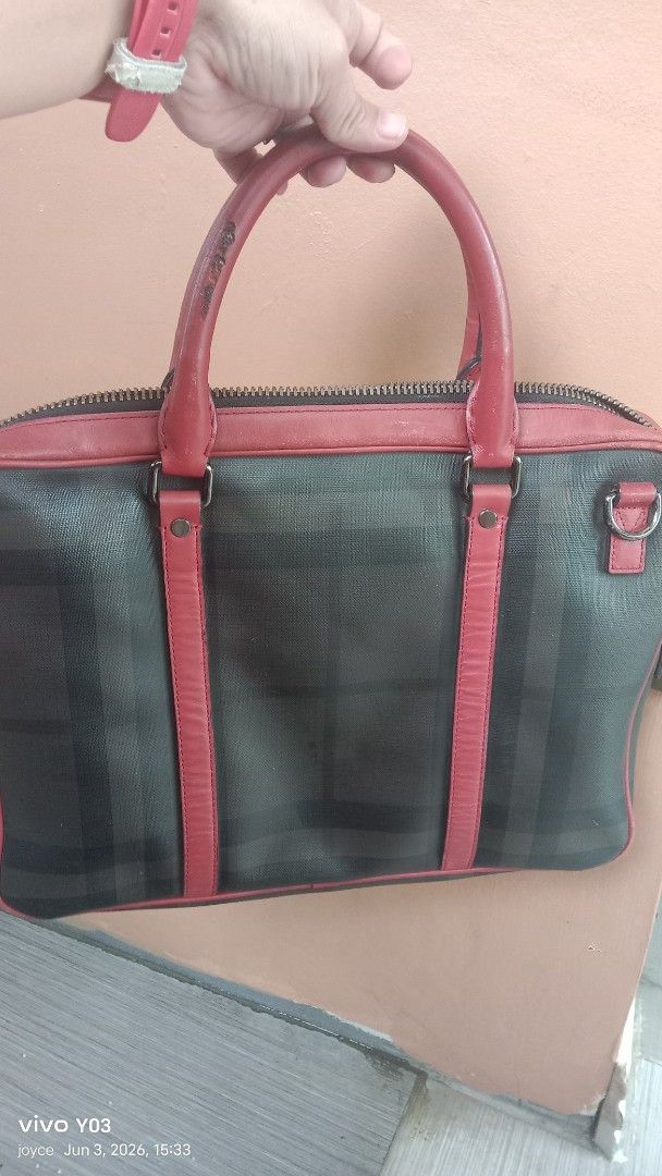 preloved authentic Burberry Nova Check Leather Trimmed Handbag (Category: Luxury Bags & Wallets) located in Cabuyao City. Submitted by selections888 (Listing ID 1441715269, Image 2). Description: -preloved from Japan supplier -authentic -large size -with made and serial /code - Classic Burberry handbag - Iconic Nova Check pattern - Red leather trim and handles - Zipper closure - Interior tag: 'Made in China' - Great for daily use or travel -expec