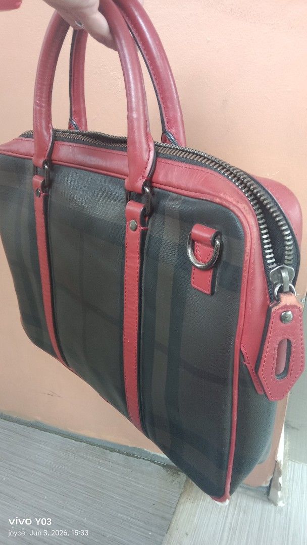 preloved authentic Burberry Nova Check Leather Trimmed Handbag (Category: Luxury Bags & Wallets) located in Cabuyao City. Submitted by selections888 (Listing ID 1441715269, Image 3). Description: -preloved from Japan supplier -authentic -large size -with made and serial /code - Classic Burberry handbag - Iconic Nova Check pattern - Red leather trim and handles - Zipper closure - Interior tag: 'Made in China' - Great for daily use or travel -expec