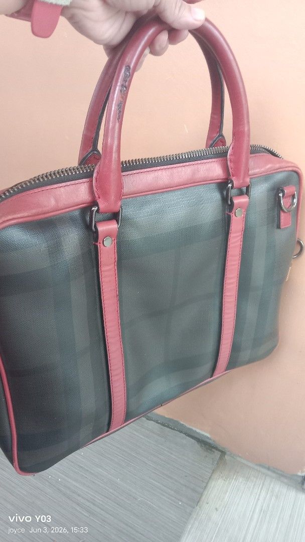 preloved authentic Burberry Nova Check Leather Trimmed Handbag (Category: Luxury Bags & Wallets) located in Cabuyao City. Submitted by selections888 (Listing ID 1441715269, Image 1). Description: -preloved from Japan supplier -authentic -large size -with made and serial /code - Classic Burberry handbag - Iconic Nova Check pattern - Red leather trim and handles - Zipper closure - Interior tag: 'Made in China' - Great for daily use or travel -expec