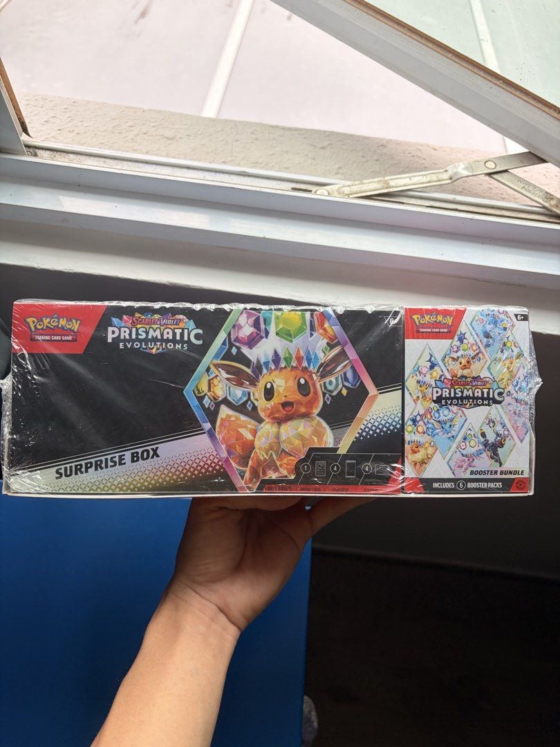 Prismatic Evolutions Surprise Box + Booster Bundle Sam’s Club Bundle (Category: Toys & Games) located in Singapore. Submitted by onehertz (Listing ID 1441604233, Image 1). Description: Brand new sealed. No trades. 5 sets available Pick up @ Bullion Park / YCK MRT (Deposit required) Or +6.2 for Speedpost (not recommended).