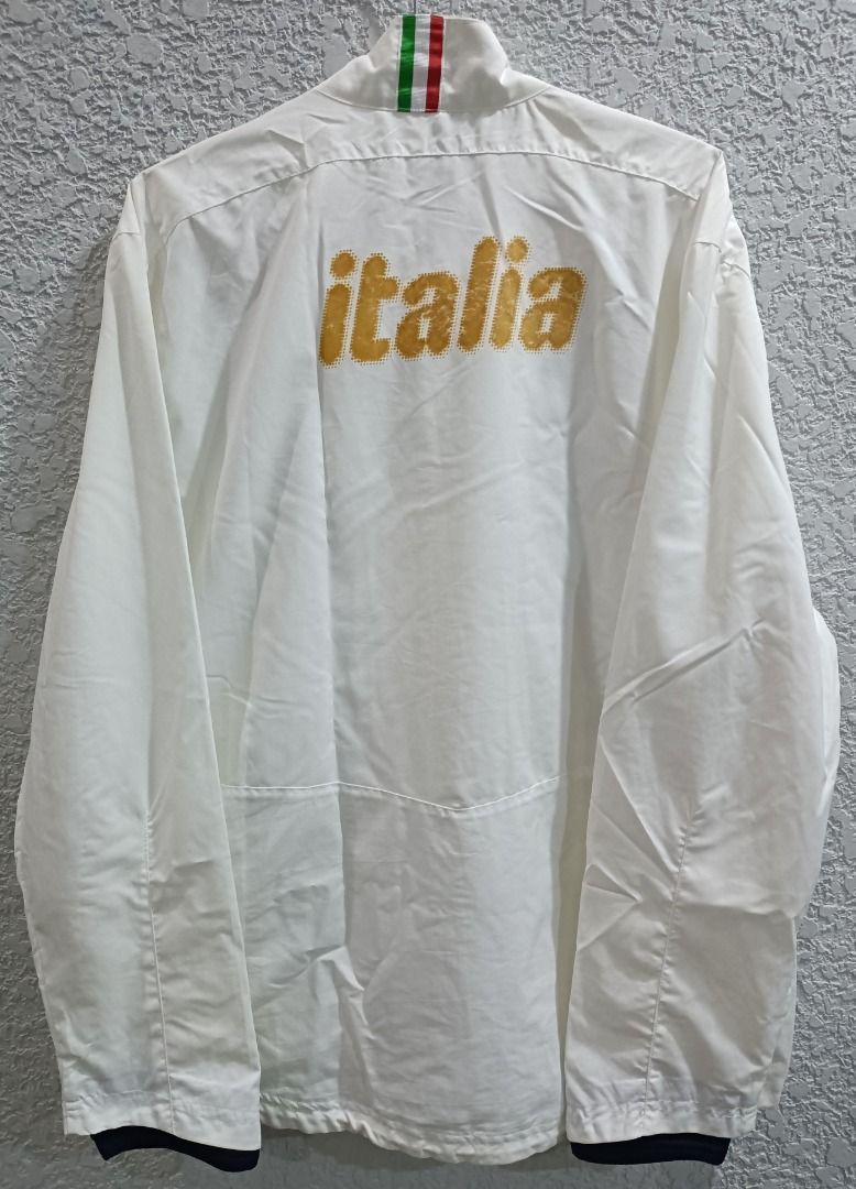(PRICE DROP) - PUMA ITALIA SOCCER WINDBREAKER JACKET FIGC (Category: Coats, Jackets and Outerwear) located in Calamba. Submitted by rootsph (Listing ID 1441670097, Image 2). Description: Details: Fits XL. Dimes: 24W x 28L Color: White Condition: Excellent, no issue, neck tag faded and cut wash tags (half of QR code still visible) Please manage your expectation, item being sold is preloved and not brand new unless stated otherwise. Major and minor