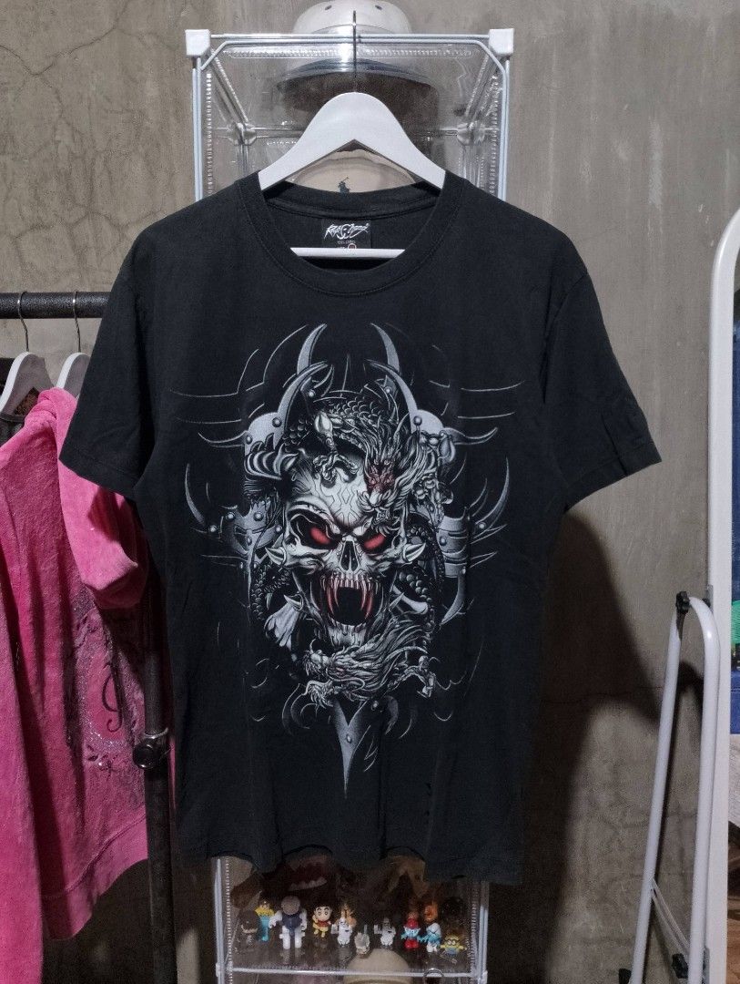 Rock Chang Skull Dragon Graphic Tee Size Medium (Category: Tshirts & Polo Shirts ) located in Maasin. Submitted by throwingreverse (Listing ID 1441739389, Image 1). Description: Purchase two or more from my listing and you will get this for free. LET ME KNOW IF YOU WANT IT. GLOW IN THE DARK T-SHIRT . Size: Medium Dimes: L 27.5 W 17.5 Issue: Pinhole (See last pic) Color rate: 7/10 MOP: Gcash Location: Southern Leyte.