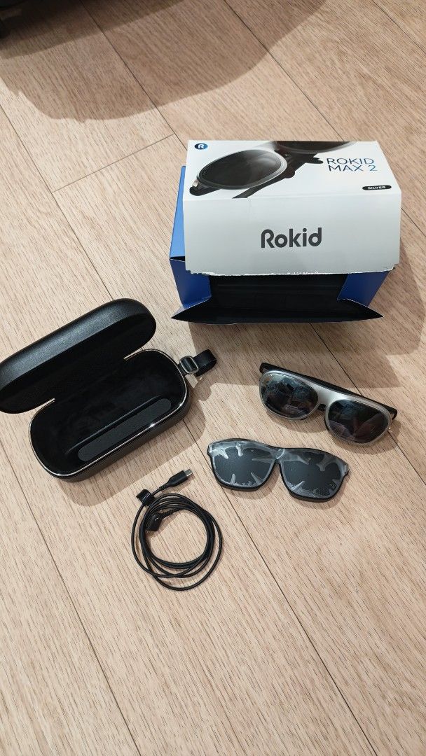 Rokid Max 2 AR Glasses Full Box - Silver (Category: Virtual Reality) located in Singapore. Submitted by s.market (Listing ID 1441668577, Image 1). Description: Rokid Max 2 AR Glasses — Lightly Used, Complete in Box Up for sale is a lightly used pair of Rokid Max 2 AR glasses in excellent condition. These have seen minimal use and show no signs of wear. Comes complete with the original box and all included accessories, so the next owner gets every