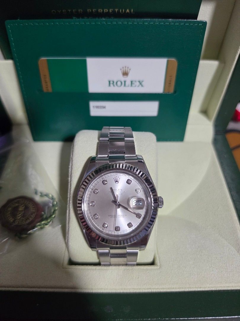 Rolex Datejust 41 Silver 116334 Diamond Dial 2015 (Category: Watches) located in Singapore. Submitted by chaezkk (Listing ID 1441331236, Image 2). Description: Rolex Datejust 41mm Silver 116334 Diamond dial, fluted bezel with oyster bracelet Local AD dated Jan 2015 Full set double box, manual, card, red tag and extra links Watch protector applied Seldom worn Receipt can be shown on deal date Authentication welcome but at your own expense Viewing 