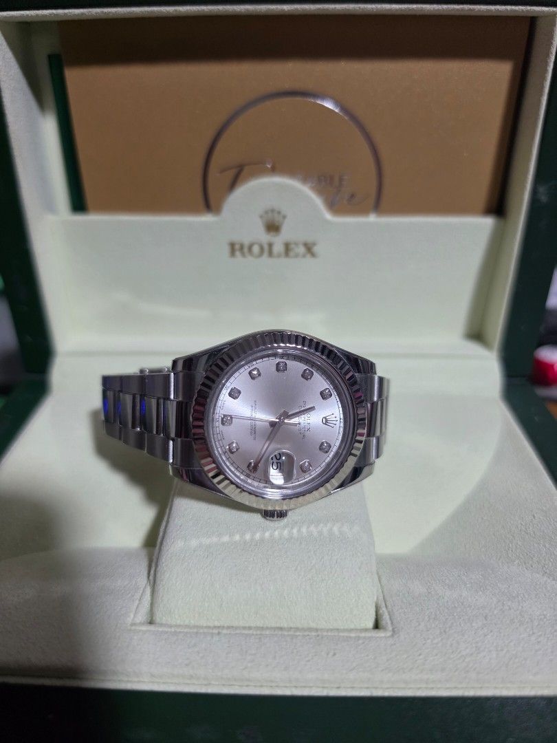 Rolex Datejust 41 Silver 116334 Diamond Dial 2015 (Category: Watches) located in Singapore. Submitted by chaezkk (Listing ID 1441331236, Image 3). Description: Rolex Datejust 41mm Silver 116334 Diamond dial, fluted bezel with oyster bracelet Local AD dated Jan 2015 Full set double box, manual, card, red tag and extra links Watch protector applied Seldom worn Receipt can be shown on deal date Authentication welcome but at your own expense Viewing 