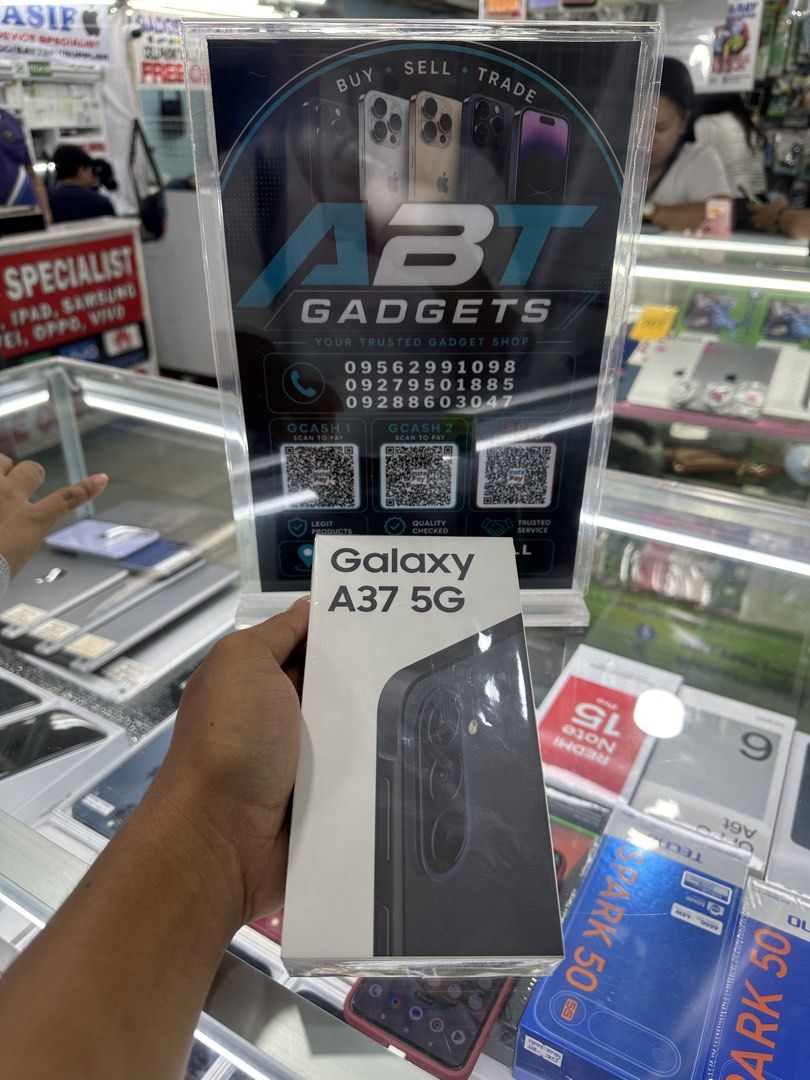 SAMSUNG A37 5G 8/128GB (Category: Samsung) located in San Juan City. Submitted by ABTGadgets (Listing ID 1441671096, Image 1). Description: 📱 SAMSUNG A37 5G 8GB/128GB 💰 Selling Price: ₱19,990 ✅ Brand New ✅ Sealed ✅ Openline ✅ NTC Variant ✅ 1 Year Warranty 📍 Store Location: Greenhills Mall 2nd Floor Phone Area Stall: XE-12 🔄 Open for Swap sa Lower Unit + Cash 🚚 Delivery Options Available ✅ Same Day Delivery within Metro Manila • Delivery fee 