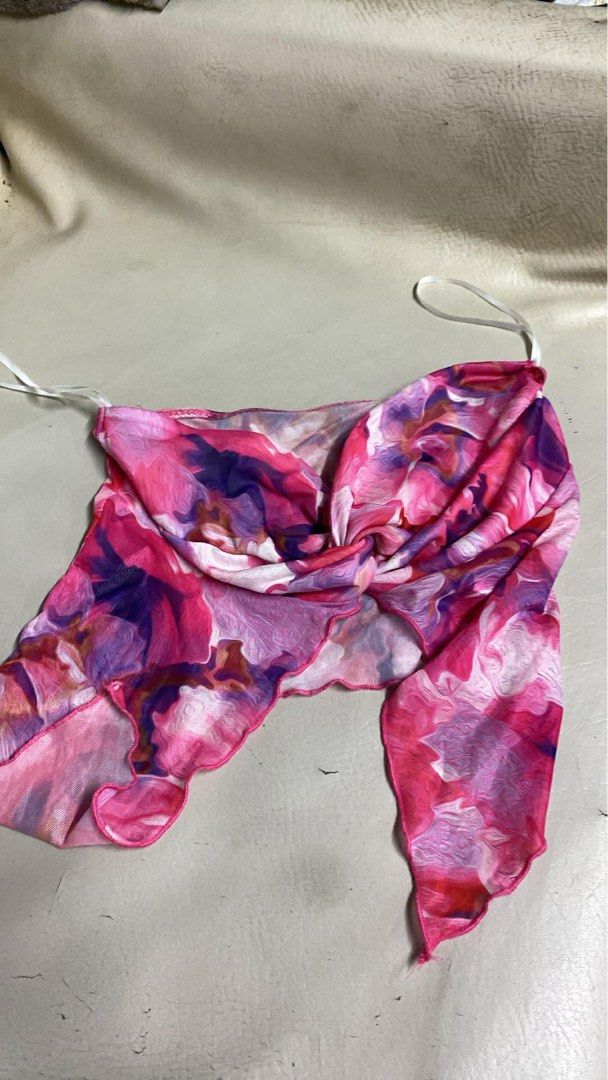 SHEIN Pink Floral Mesh Twist Front Halter Top Size S (Category: Sleeveless) located in Manila. Submitted by andy.cc (Listing ID 1441663194, Image 1). Description: - Cute pink and purple floral mesh top - Brand: SHEIN - Features: Twist front detail, halter neck tie - Perfect for layering or beachwear - Size: S.