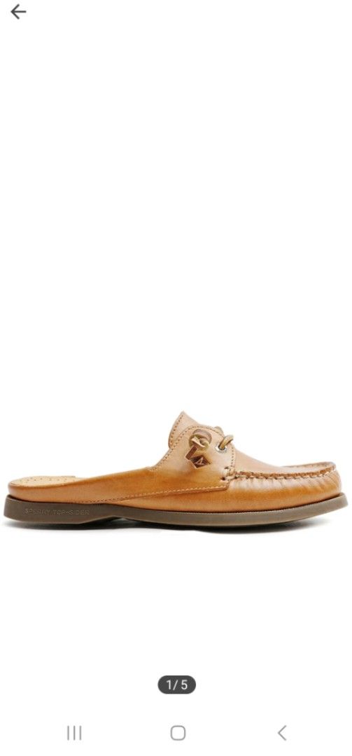 Sperry Brown Leather Boat Shoe Mules (Category: Loafers) located in Baguio. Submitted by ielle.18 (Listing ID 1441621632, Image 2). Description: - Brand: Sperry - Type: Brown Leather Mules (Boat Shoe Style) -Size: US 7.5 - Design: Classic boat shoe with laces, easy slip-on - Occasion: Perfect for casual wear.