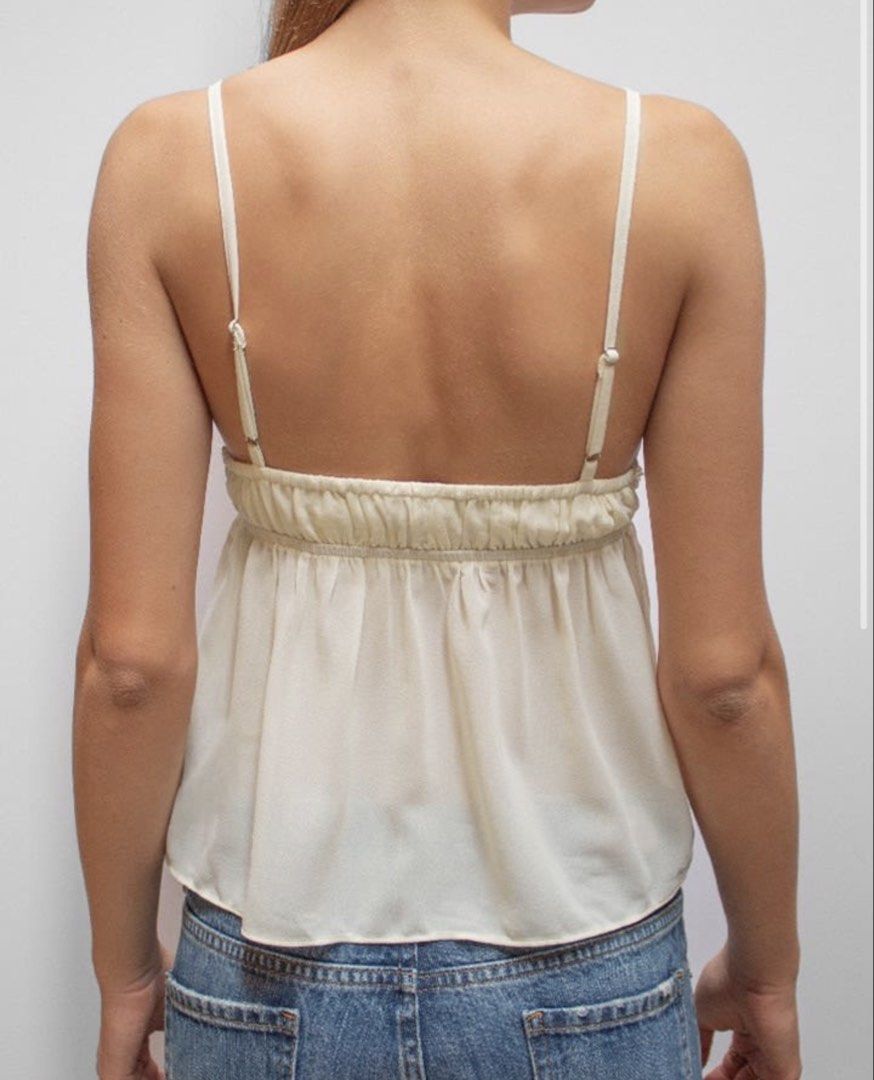 Subdued Cream Beaded V-Neck Camisole Top (Category: Sleeveless) located in Quezon City. Submitted by morespace555 (Listing ID 1441749581, Image 3). Description: Bought this from their Singapore Ion Orchard store! Removed the tag but can guarantee it's never worn, i was supposed to wear it but changed my mind Bought this for ₱3,200 in PHP Size medium on tag but fits XS-S.