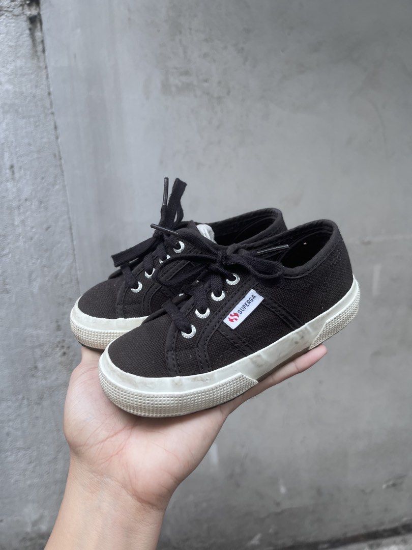 Superga Kids' Black Canvas Sneakers (Category: Babies & Kids Fashion) located in Quezon City. Submitted by kalv7 (Listing ID 1441673761, Image 2). Description: - Classic black Superga sneakers for kids - Size: EU 27 - Material: Durable canvas upper - Sole: White rubber sole - Closure: Lace-up for a secure fit - Style: Easy to pair with any outfit - Ideal for: Everyday wear and play.