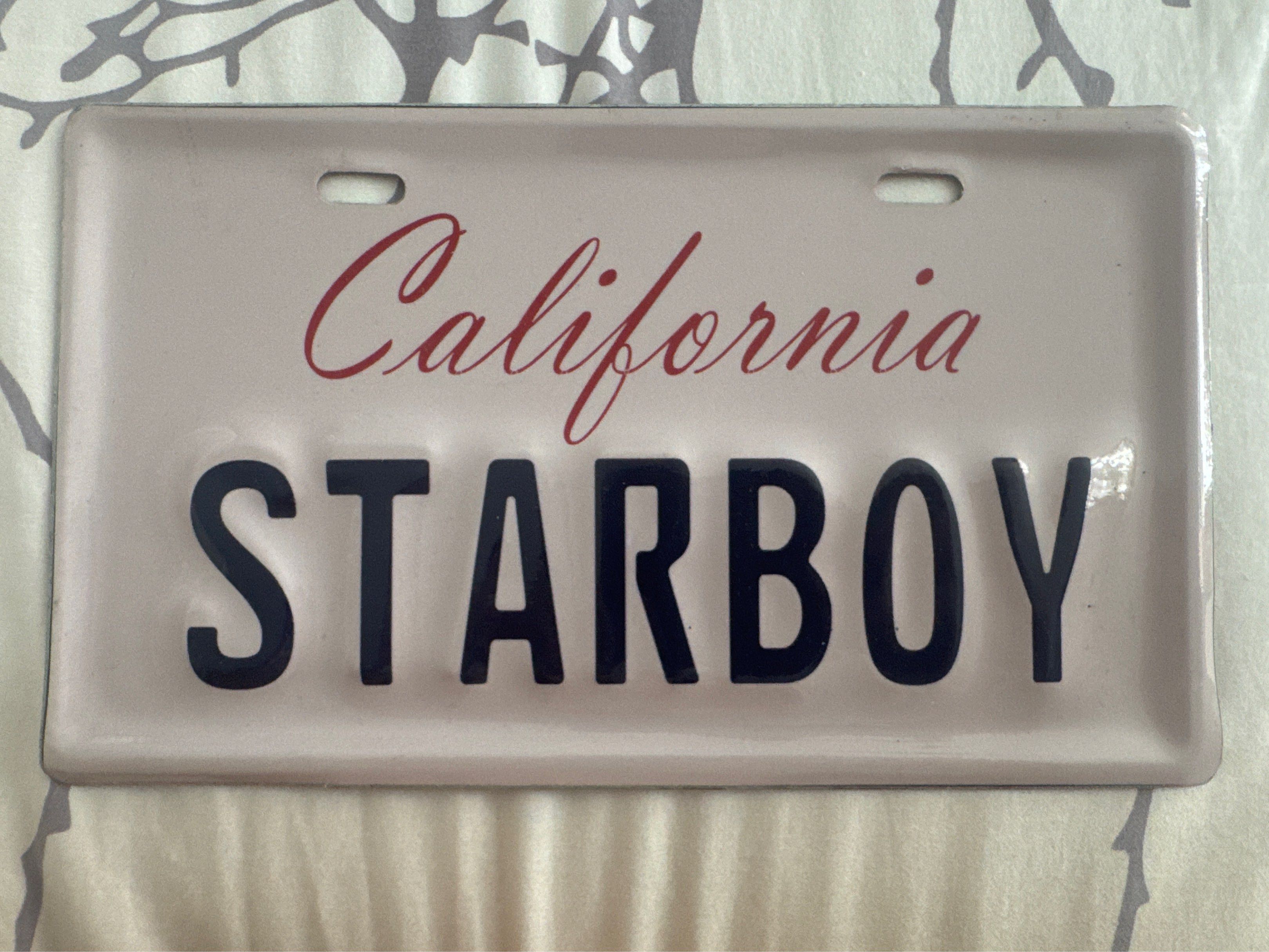 The Weeknd - Starboy license plate display (Category: Western Merchandise) located in Quezon City. Submitted by crazyadventurer (Listing ID 1441601597, Image 1). Description: The Weeknd - Starboy License plate display Php550 QC area, can do lalamove shouldered by buyer.