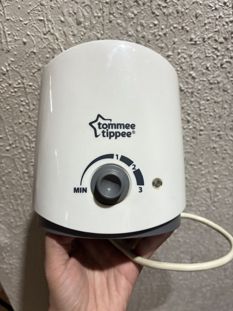 Tommee Tippee Bottle Warmer (Category: Breastfeeding & Bottle Feeding) located in Quezon City. Submitted by shopdascloset (Listing ID 1441777359, Image 3). Description: - Tommee Tippee Bottle Warmer - Simple dial control for easy temperature selection - Just add water and choose your setting - Quick and convenient warming for feeding time - Works well and is reliable.