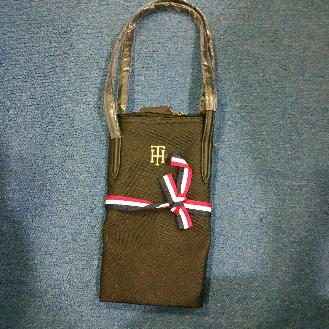Tommy tote bag (Category: Tote Bags) located in Manila. Submitted by rtins (Listing ID 1441587759, Image 1). Description: 17x11" handle 22 inches.