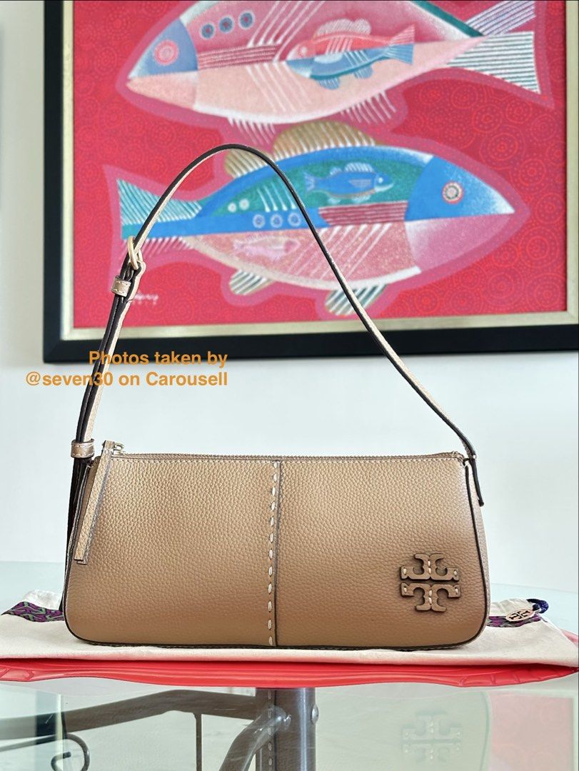 Tory Burch McGraw Wedge Shoulder Bag (Tiramisu) (Category: Luxury Bags & Wallets) located in Cebu City. Submitted by seven30 (Listing ID 1441649251, Image 3). Description: Authentic Tory Burch Shoulder Bag Details - Color: Tiramisu - Stitching detail on front and sides. - Gold hardware with stitched Tory Burch logo in the same leather material. - Zipper closure. - Adjustable strap. Inclusions: - Original Dust Bag *All inclusions are shown in phot