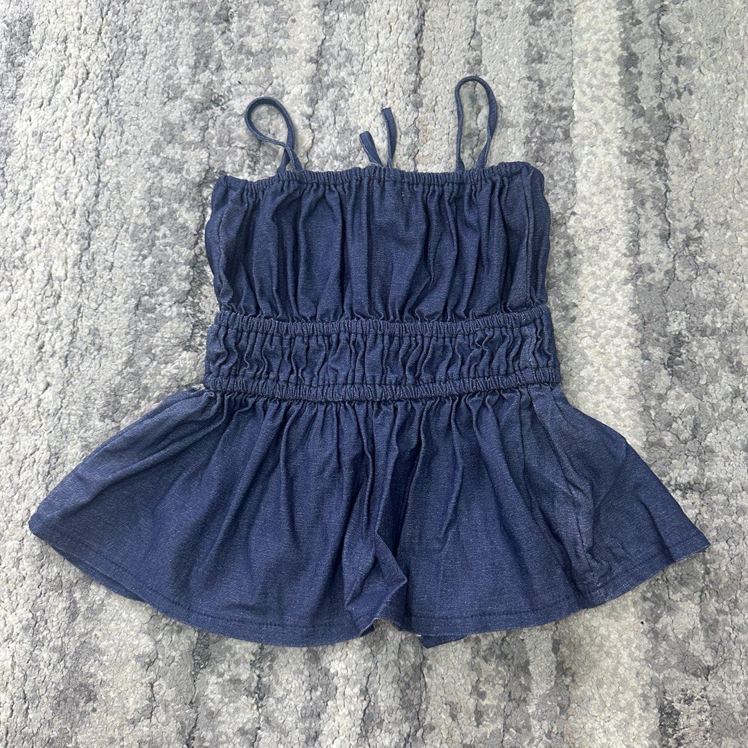 UFA by NED Denim Corset Top (Category: Sleeveless) located in Quezon City. Submitted by _cc_declutters (Listing ID 1441666693, Image 3). Description: - Cute denim top from UFA by NED - Features a ruched bodice with a lace-up front - Elasticated waistband for a comfy fit - Skirt part flares out - Versatile for casual day or night out.