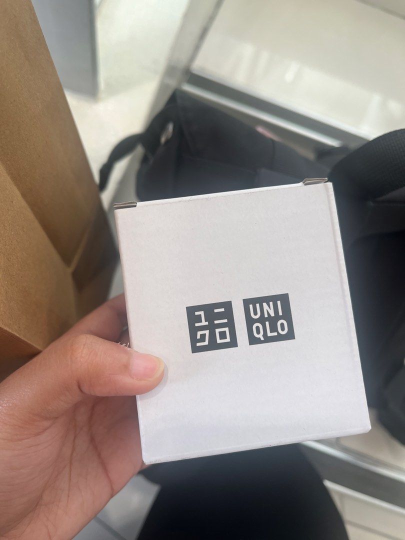 Uniqlo Reusable Shopping Bag (Category: Tote Bags) located in Bulacan. Submitted by veentheredonethat (Listing ID 1441737187, Image 1). Description: UNIQLO PACKABLE DUFFLE BAG negotiable. Location: QC/Fairview - Uniqlo reusable shopping bag - Folds up small for easy storage - Ideal for groceries and everyday use - Color: butter cream with pink accents - Authentic Uniqlo purchase.