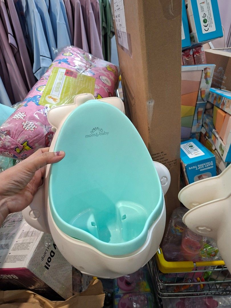 URINAL TRAINER (NO BOX) (BRANDNEW) (Category: Toilet Training) located in Caloocan City. Submitted by little_cleison_shop (Listing ID 1441762577, Image 1). Description: available color green (2pcs) blue (1pc) issue •no box •wala na pang-sabit pbrandnew po yan pullout from baby fair , nawala lang yun box nya nun baby fair.