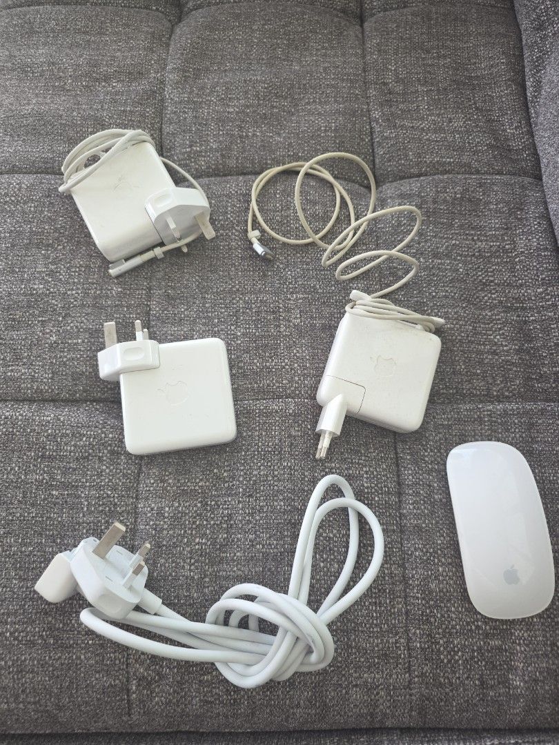 Various MacBook Chargers and legacy magic mouse